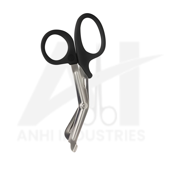 Medical bandage scissors with serrated blade and plastic handle